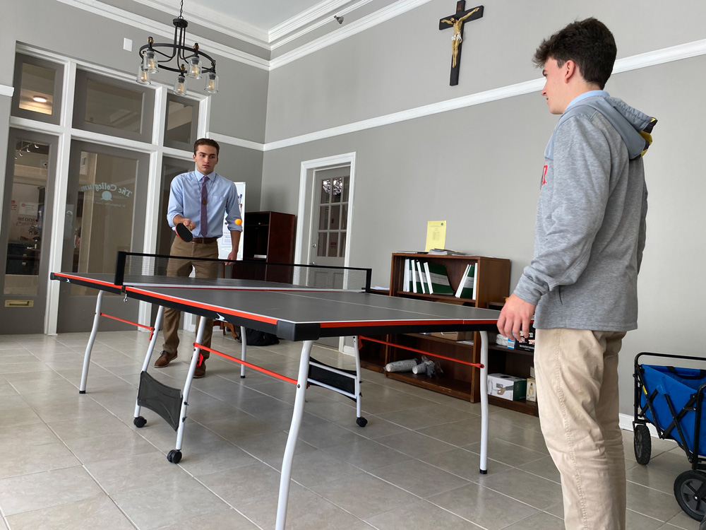 students playing ping pong